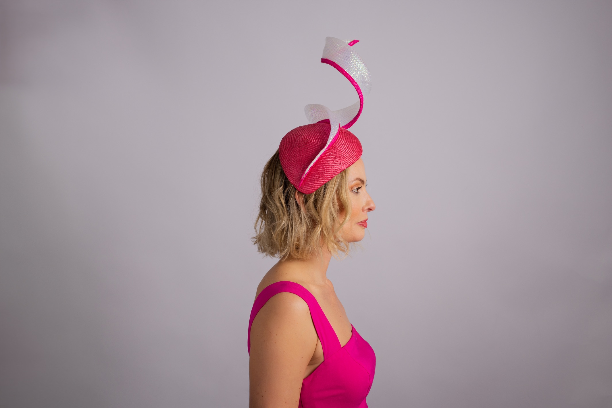 Pink Helix: Pink teardrop fascinator with sculptural crinoline swirl