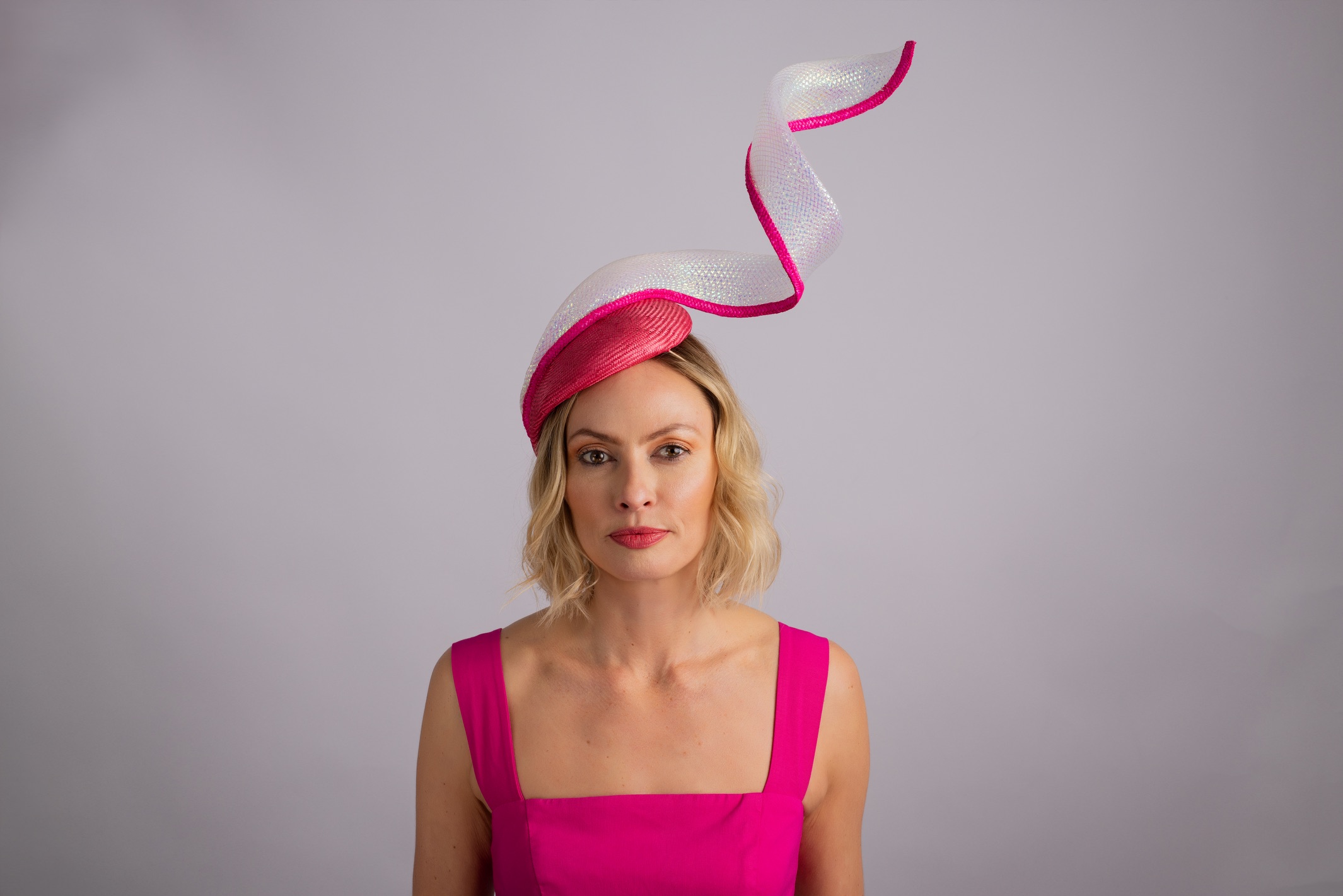 Pink Helix: Pink teardrop fascinator with sculptural crinoline swirl