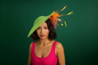 Free Spirit: neon green fascinator with colourful feathers