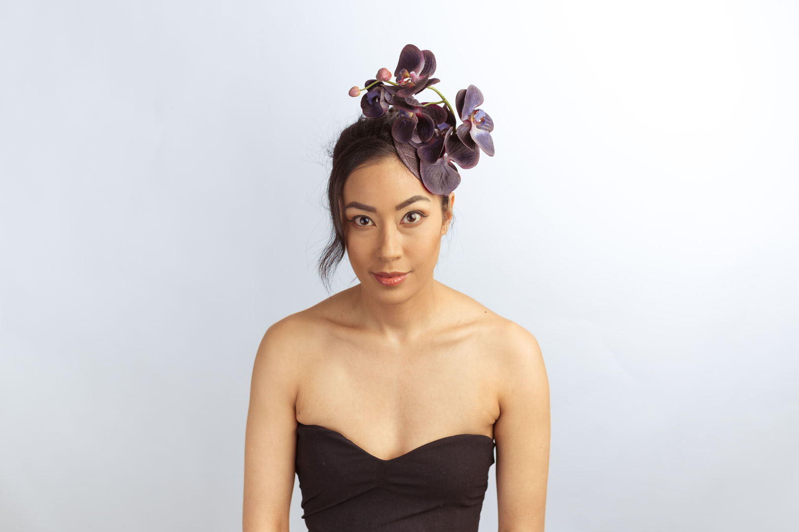 Simonetta Vespucci: Purple orchid fascinator